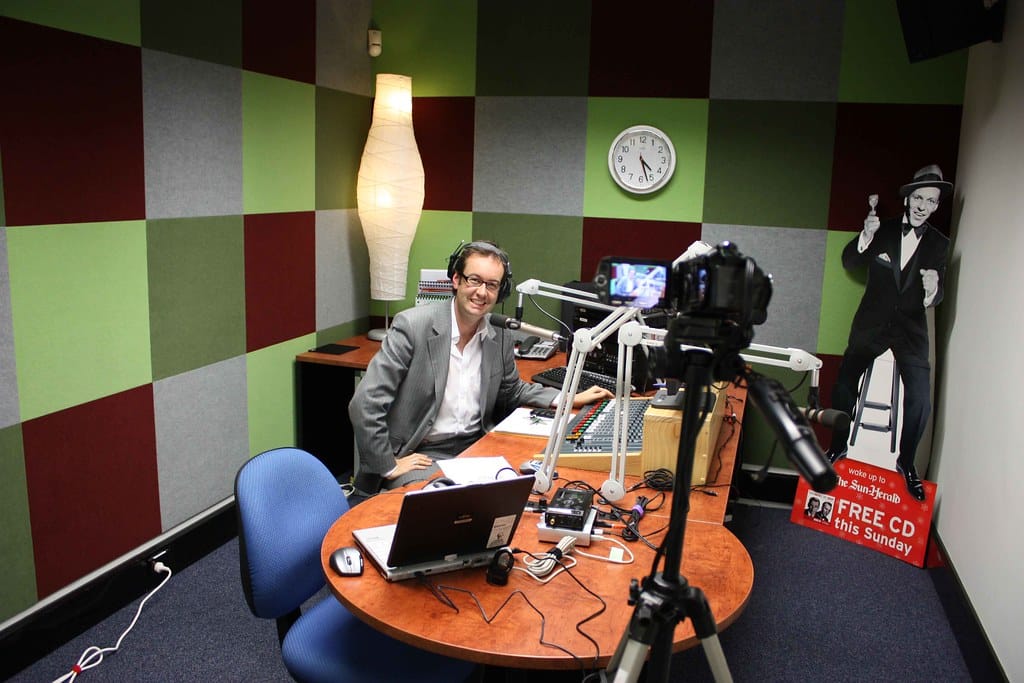 Calling the radio station to request a song, over and over