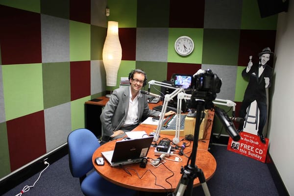Calling the radio station to request a song, over and over